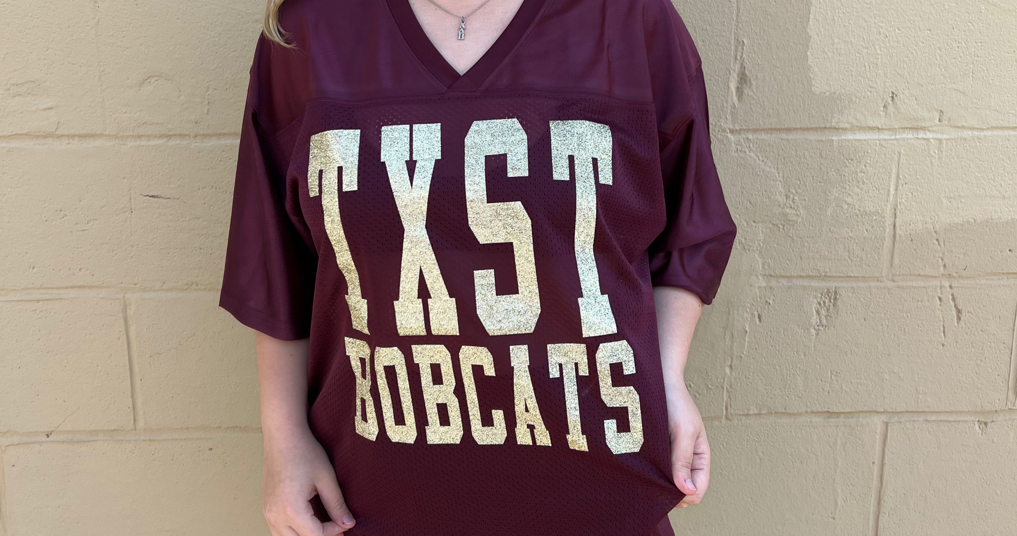 Maroon TXST BOBCATS Football Jersey with Gold Glitter Lettering