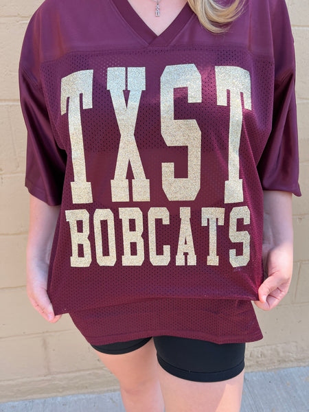 Maroon TXST BOBCATS Football Jersey with Gold Glitter Lettering